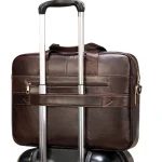 Pochette ordinateur en cuir véritable style vintage sur valise Pochette ordinateur en cuir véritable style vintage sur valise